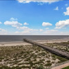Отель Beach Condo Miles-long Views Sand and Sea, Access to Private Fishing Pier by RedAwning, фото 14