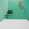 Отель SPOT ON 91732 Rani Homestay Syariah, фото 2