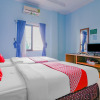 Отель Super OYO 90072 Apri Inn Syariah, фото 3