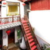 Отель Lijiang Anxiangge Inn, фото 1