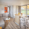 Отель Beautiful Chalet With air Conditioning, in a Holiday Park, 1.5 km From the Beach, фото 7