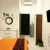 Отель Comfy Room in Piliau Residence, фото 3