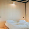 Отель Modern chalet with terrace, located in a holiday park 800 m. from the beach, фото 11
