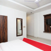 Отель OYO 15566 Hotel Rosewood Inn, фото 15
