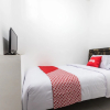 Отель OYO 1598 Feby Inn Near RS Gandaria, фото 11