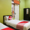 Отель OYO 1156 Fanybella Homestay, фото 5