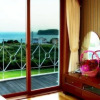 Отель Jeju Land Pension, фото 7