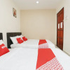 Отель OYO 89902 Semerah Suites Homestay, фото 6