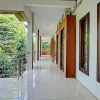 Отель OYO 90476 Iksan Homestay Syariah, фото 9