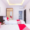 Отель OYO 1118 Artomoro Family Guesthouse, фото 11