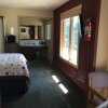 Отель Thomsonite Beach Inn & Suites, фото 8