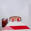 Отель OYO 90387 Sepakat Guest House, фото 6