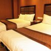 Отель Longxiang Business Hotel в Nanchong