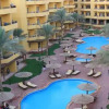 Отель Pool View Apartments At British Resort Unit 15, фото 14