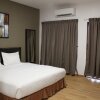 Отель 89915 East Mount Hotel в Понтиане