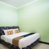 Отель SPOT ON 2729 Marzan Syariah Guest House, фото 24
