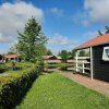 Отель Beautiful Holiday Home With a Veranda and Jetty, фото 12