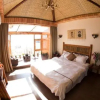 Отель Lijiang Lugu Lake Chujian Homestay, фото 6