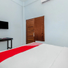 Отель OYO 2450 Hening Homestay Near Pantai Tanjung Bias, фото 12