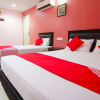 Отель OYO 11343 Hotel Putra Iskandar, фото 5