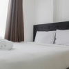 Отель Homey and Cozy 2BR Bassura City Apartment near Mall, фото 15