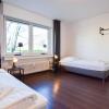 Отель Tolstov Apartments - 1-4 Room Apartments - 20 min DUS Airport & MESSE DUS в Мербуше