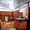 Отель Saadani Safari Lodge - bush, river, beach, фото 21