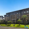 Отель Nanxing holiday hotel (Mount Emei tourist center, Emeishan high-speed railway station), фото 1
