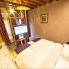 Отель Lijiang Yunman Inn, фото 2