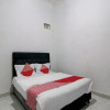 Отель OYO 92111 Dinda Homestay Syariah, фото 5