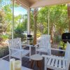 Отель Artist's Getaway ~ Large Screened Porch ~ Golf Cart & PET Friendly, фото 8