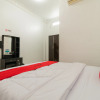 Отель RedDoorz Syariah near Universitas Putra Indonesia Padang, фото 4