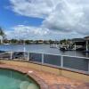 Отель SPECTACULAR WATERFRONT Canal Home, BRIBIE ISLAND в Банксия-Бич