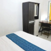 Отель OYO 91026 Kasmarani Residence Syariah, фото 6