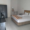 Отель MyHomeStay Kita Pulau Merah, фото 2
