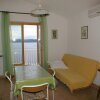 Отель Apartment Niko - 50 m from pebble beach: A4 Pisak, Riviera Omis, фото 8