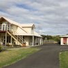 Отель Logans Beach House and Apartments, фото 1