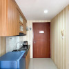 Отель Cozy Stay Studio At Tamansari Mahogany Karawang Apartment, фото 2