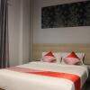 Отель Super OYO Capital O 1630 Hotel Syariah Ring Road, фото 4
