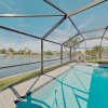 Отель Impeccable Canal-front W/ Lanai & Caged Pool 4 Bedroom Home, фото 13