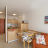 Отель Lignano Sabbiadoro - Appartamento Residenza Puerto Do Sol, фото 8