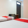 Отель OYO 153 Monclaire Suites, фото 4