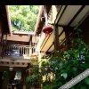 Отель Lijiang Lion Mountain Inn, фото 11