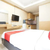 Отель OYO 93547 Metro Suites Apartment By Barbie Homestay, фото 4