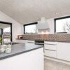 Отель 10 Person Holiday Home in Lokken, фото 9