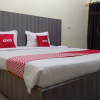 Отель OYO 1694 Pariban Homestay, фото 25