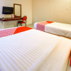 Отель OYO 3936 Hotel Trisula Makassar, фото 6