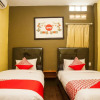 Отель OYO 1052 Sentosa Jaya Guest House Syariah, фото 5