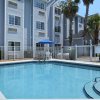 Отель Microtel Inn & Suites by Wyndham Palm Coast I-95, фото 1
