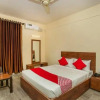 Отель OYO 26565 Rajatha Mahal, фото 4